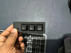 Black PicoPad 3x1 flat held in hand