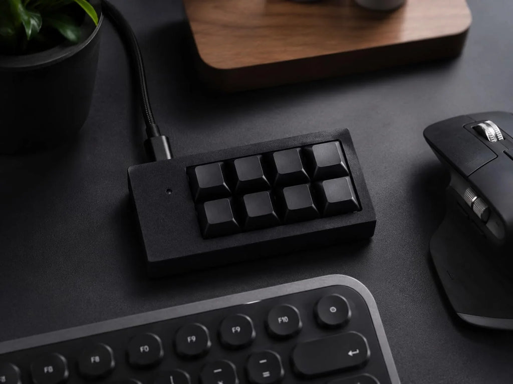 PicoPad 4x2 8-key macro pad on a desk next to a keyboard and mouse