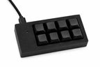 Dice & Layers PicoPad 4x2 macro keyboard with 8 black mechanical keys and USB-C cable