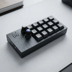 PicoPad 5x3 15-key macro pad at an angle on a grey desk