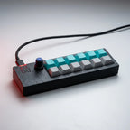 PicoPad 6x2 macro pad with USB-C cable at a low angle